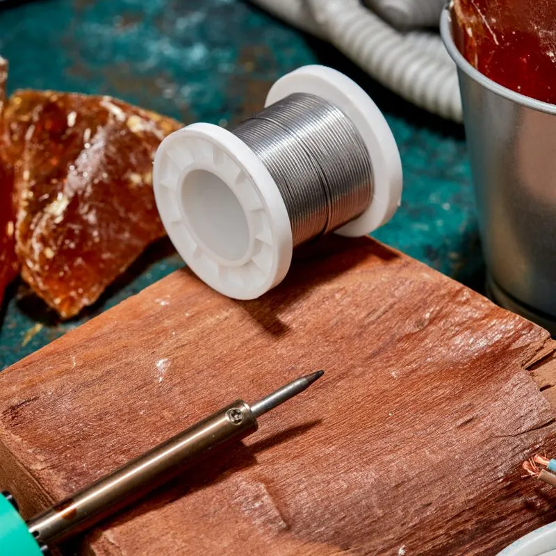 Припой с канифолью ПОС-61, 100г, Ø1мм, (олово 61%, свинец 39%), катушка REXANT - Фото 4